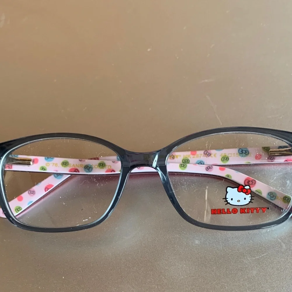 Hello Kitty Black Frame Sunglasses with Pink Patterned Temples